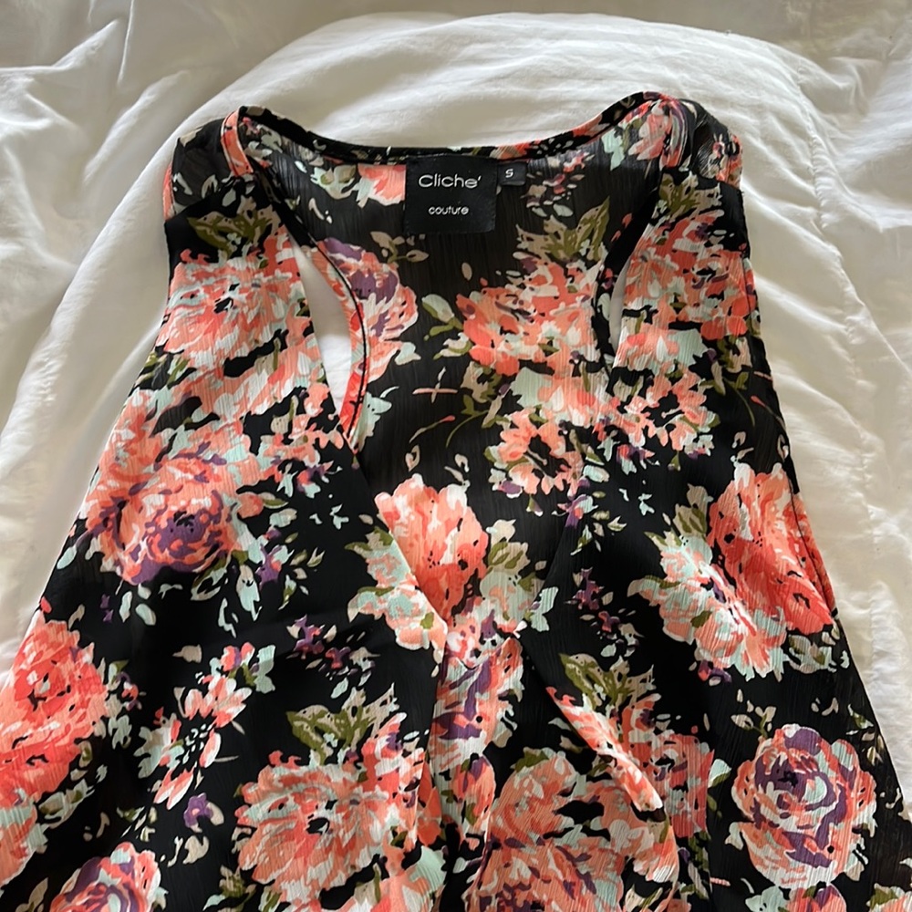 Very flowey cute blouse for spring! Sheer front flows and covers stomach area